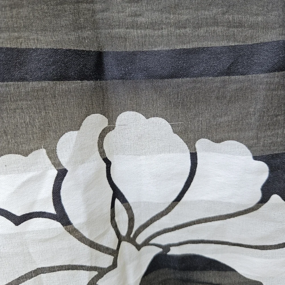 square black scarf with sheer stripes and white flowers